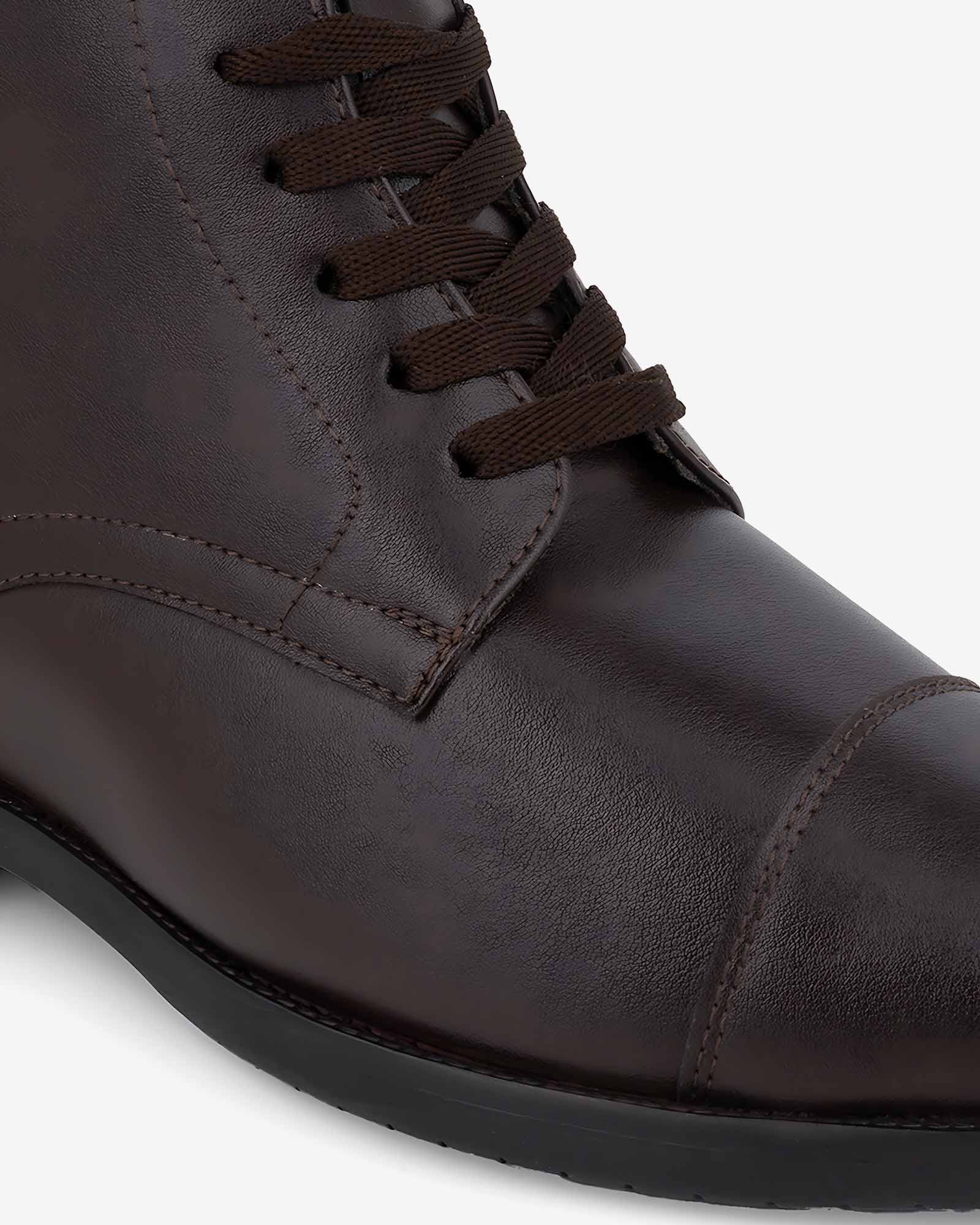 Close-up front view of Hitoes Darsel  brown elevator formal boots with built-in height lift