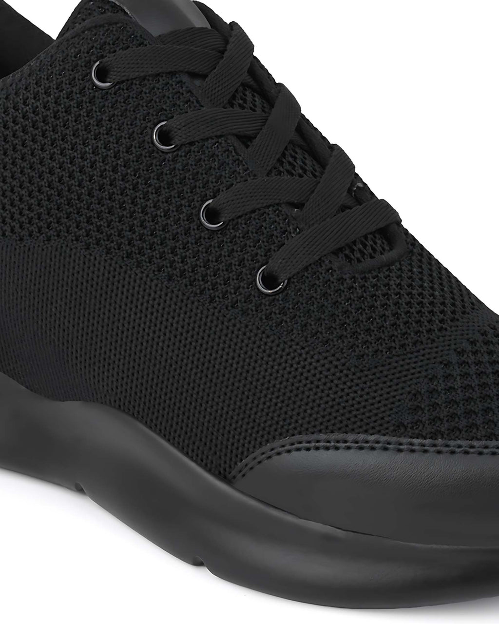 Close-up front view of Hitoes Strym black elevator shoes with built-in height boost