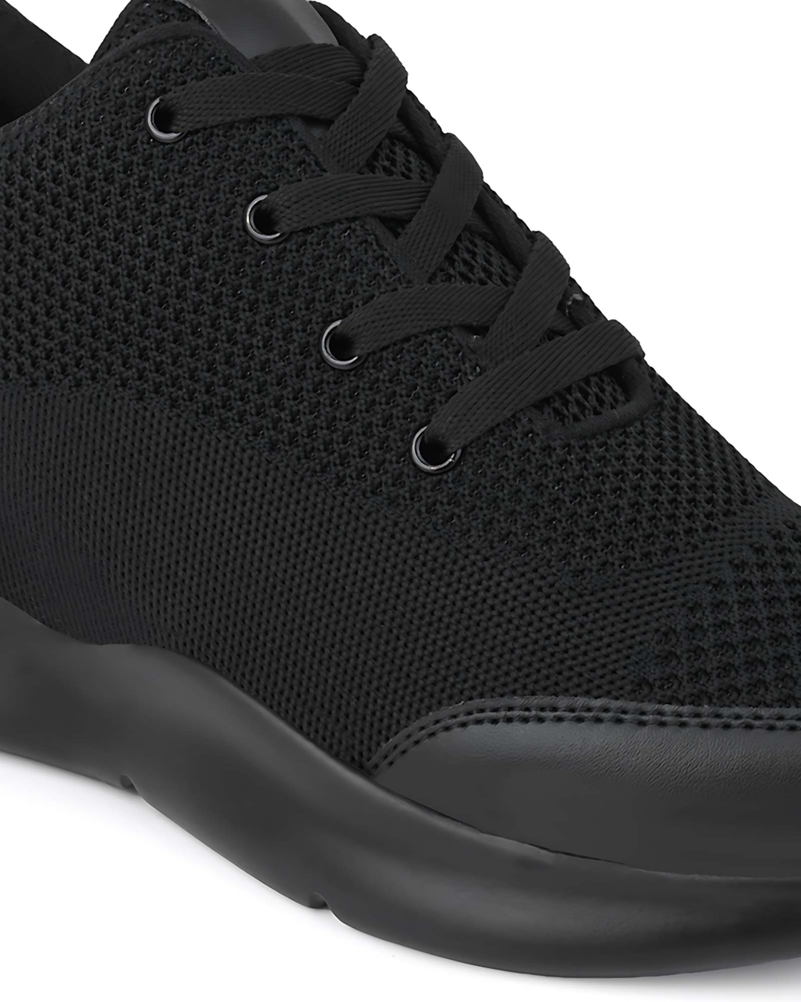 Close-up front view of Hitoes Strym black elevator shoes with built-in height boost