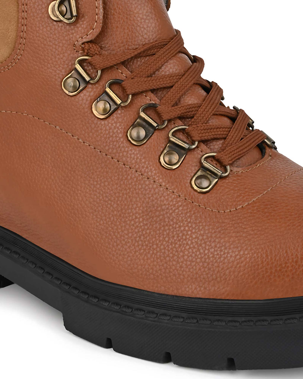 Close-up front view of Hitoes Troxxon tan elevator boots with built-in height lift