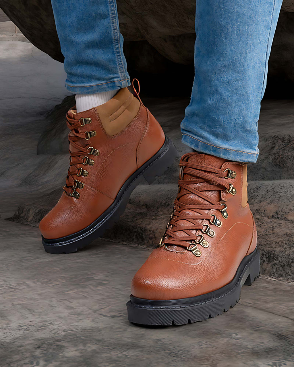 Lifestyle model wearing Hitoes Troxxon tan height increasing boots with 3 inches hidden lift