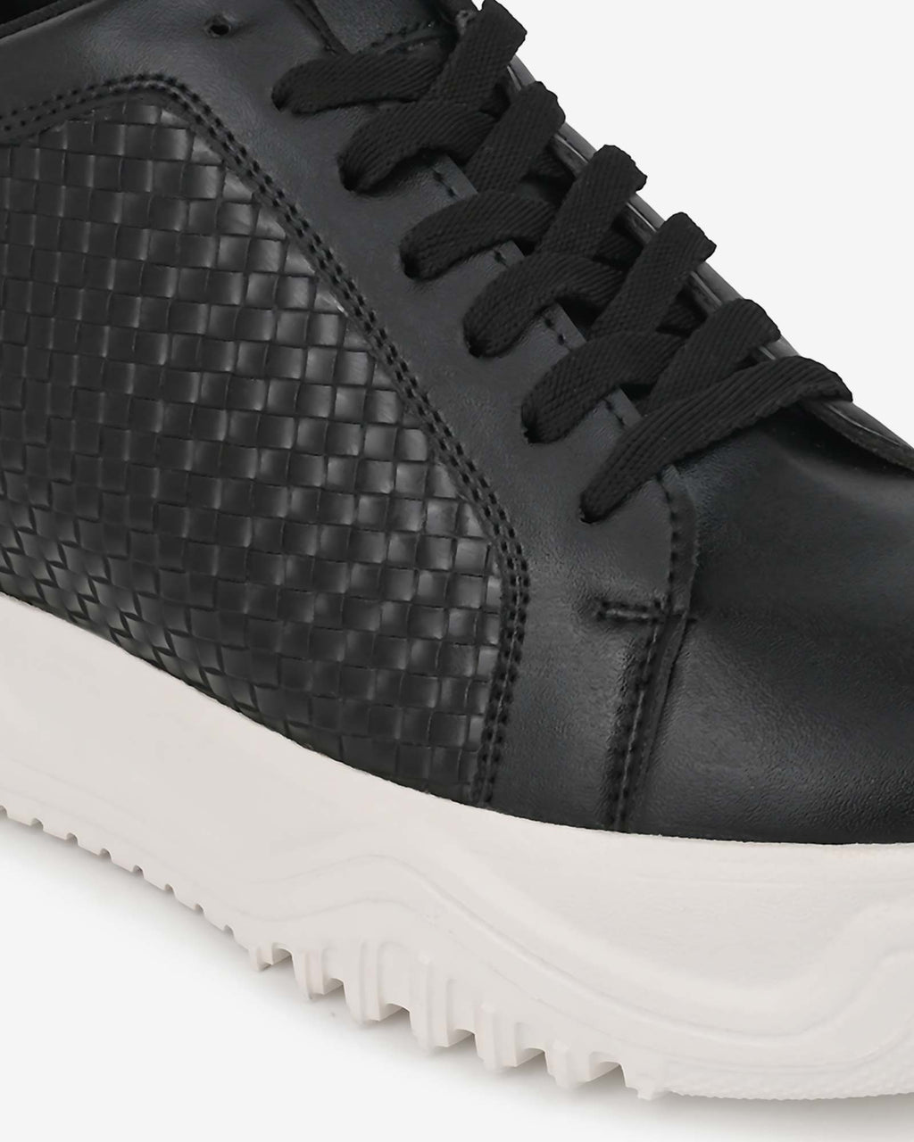 Close-up front view of Hitoes Zyft Matrix black elevator sneakers with built-in height boost