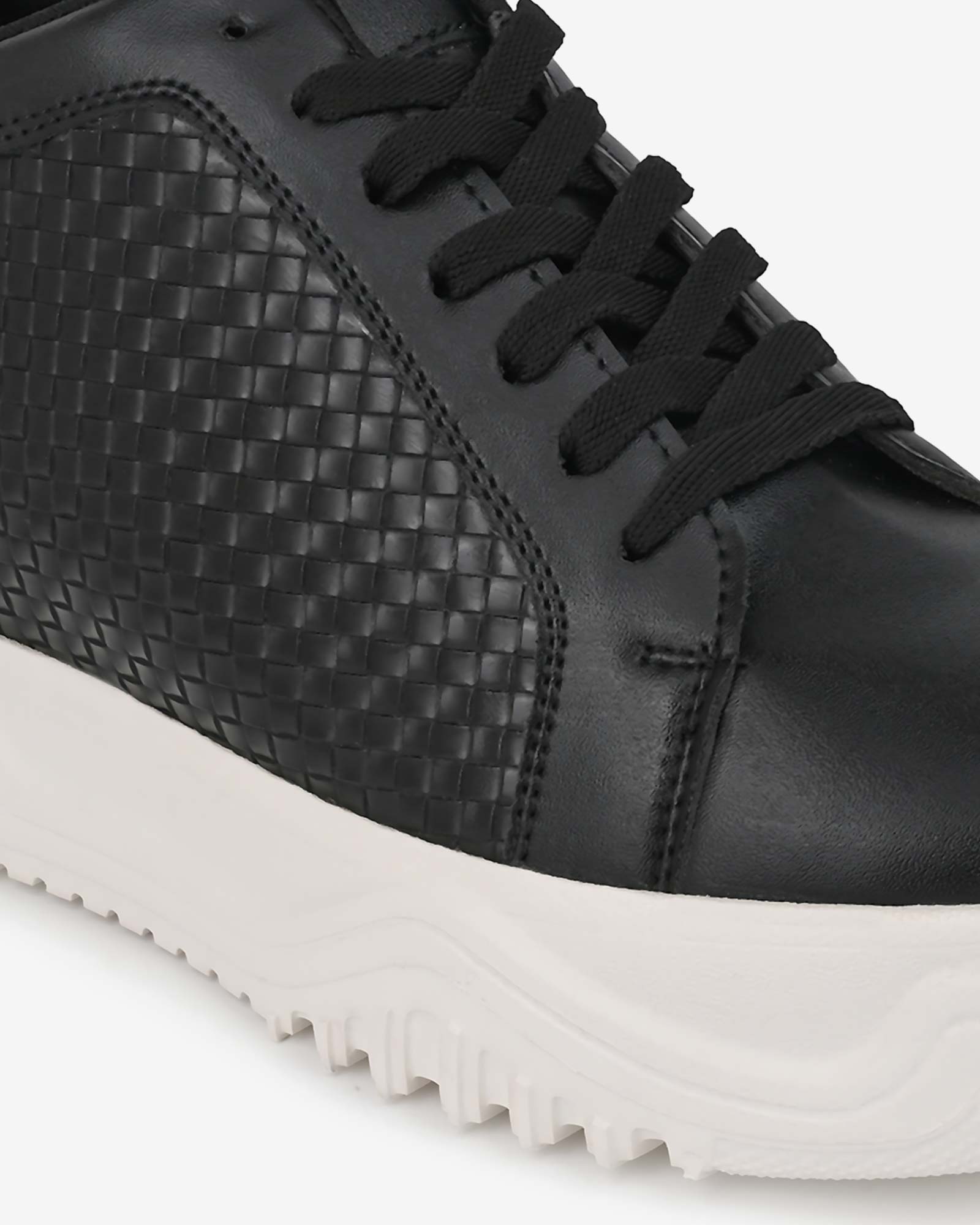 Close-up front view of Hitoes Zyft Matrix black elevator sneakers with built-in height boost